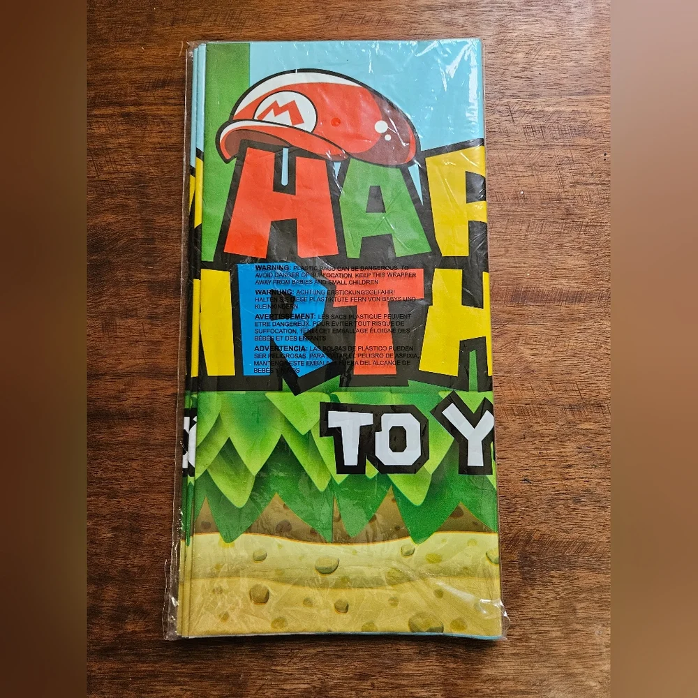 New in the bag 3 pack of Mario birthday plastic table clothes